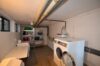 Charmante 2,5-Zimmer-Hochparterrewohnung mit Balkon und moderner Ausstattung - Waschraum